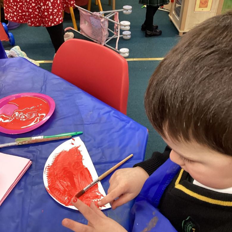 Young boy painting 